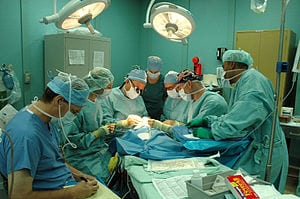 Medical staff from Operation Smile and the Military Treatment Facility aboard the USNS Mercy, perform a cleft lip surgery during the ship’s visit to provide humanitarian and civic assistance to the people of Bangladesh.